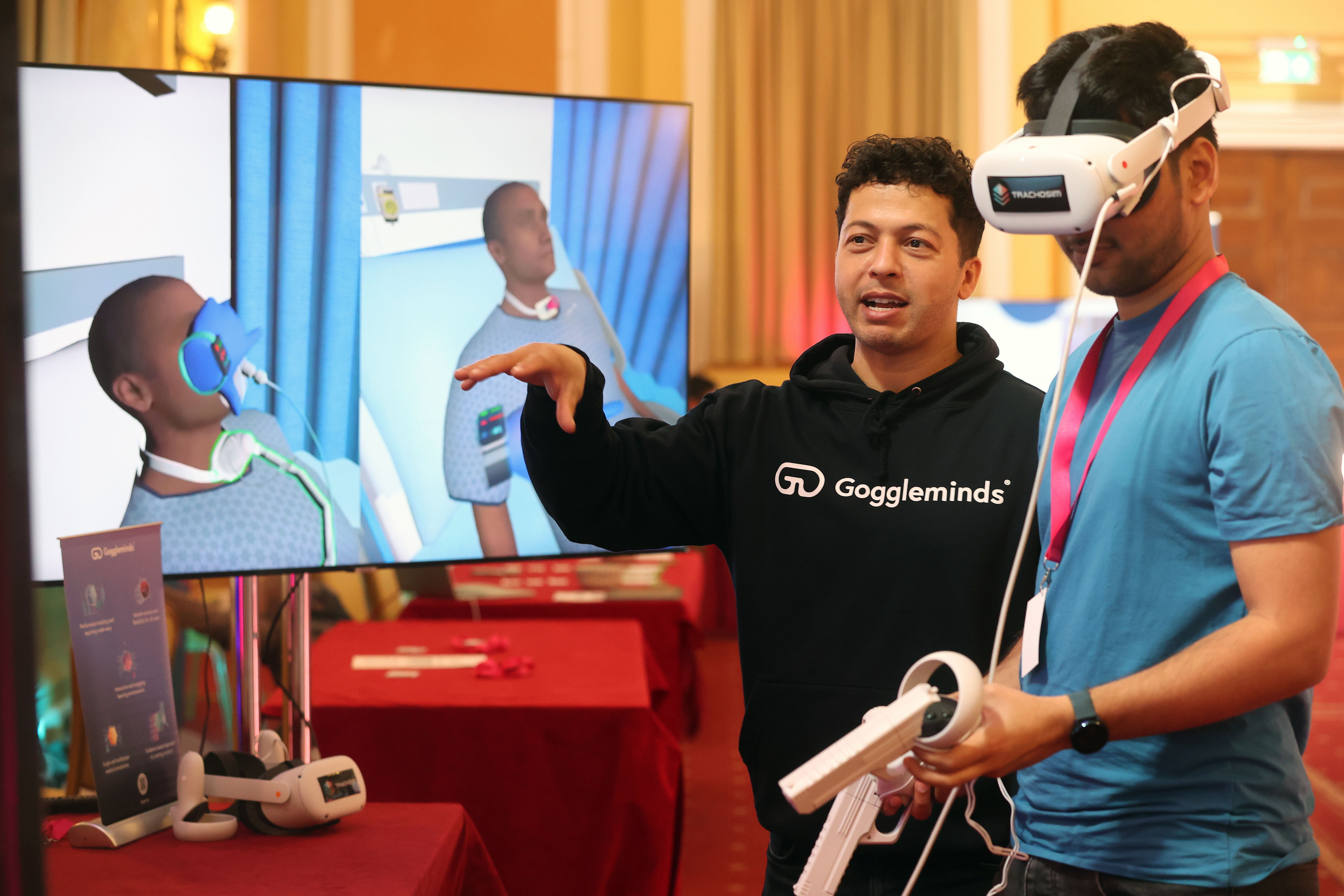 Azize Naji of Goggleminds demonstrates his R&D using a VR headset